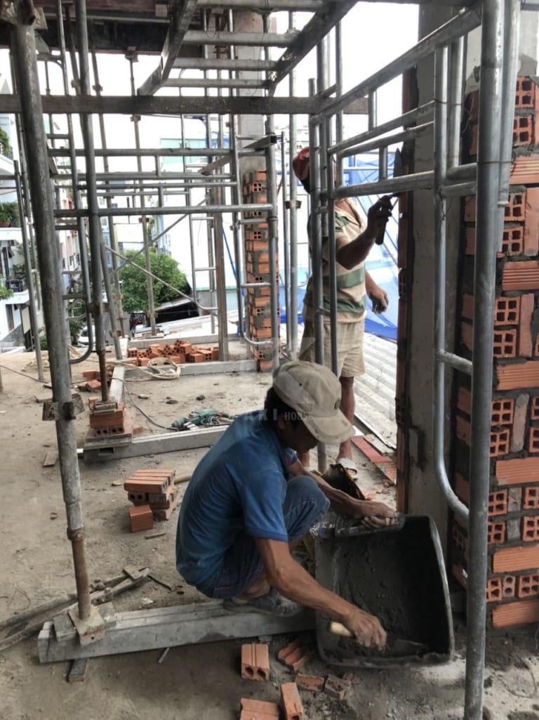 Thi công trọn gói nhà phố 4 tầng trong kiệt mặt tiền tối giản thông thoáng